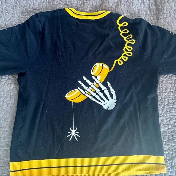 Retro “Still Holding” Black and Yellow Graphic Sweater - Picture 2 of 4